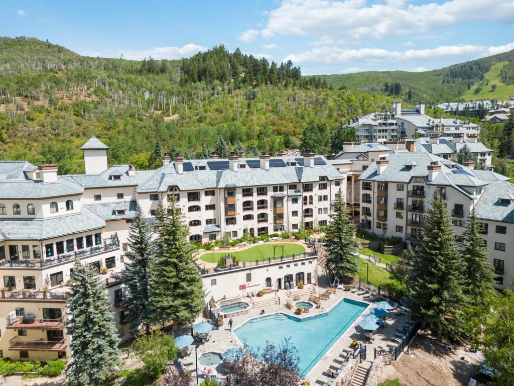 an aerial view of a resort with a pool at The Charter at Beaver Creek in Beaver Creek