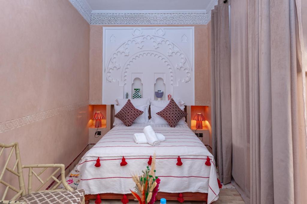 Postel nebo postele na pokoji v ubytování Riad Amalia
