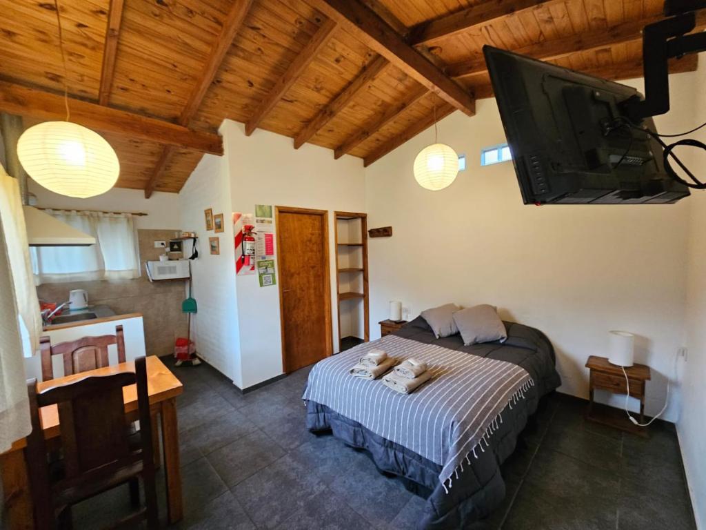 Postel nebo postele na pokoji v ubytování Punto Sur Cabañas