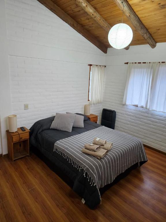Postel nebo postele na pokoji v ubytování Punto Sur Cabañas