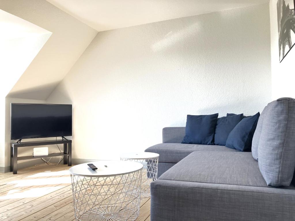 Et opholdsområde på Two-bedroom Apartment Located On The Third Floor Of A Four-story Building In Fredericia