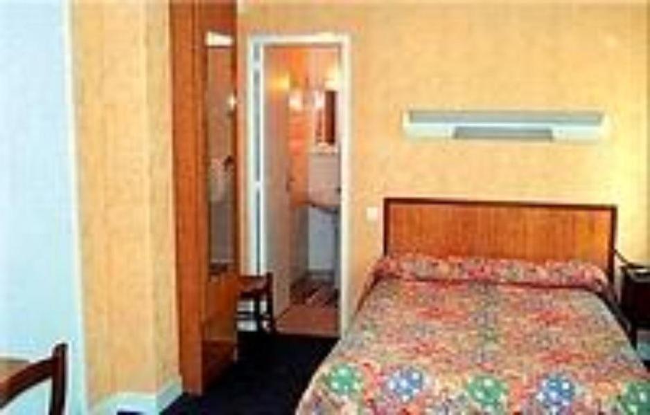 Postel nebo postele na pokoji v ubytování Le Clos Normand