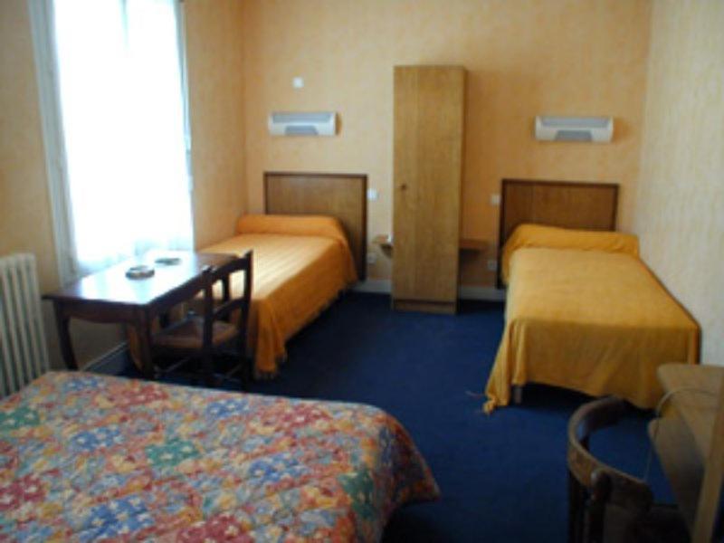 Postel nebo postele na pokoji v ubytování Le Clos Normand