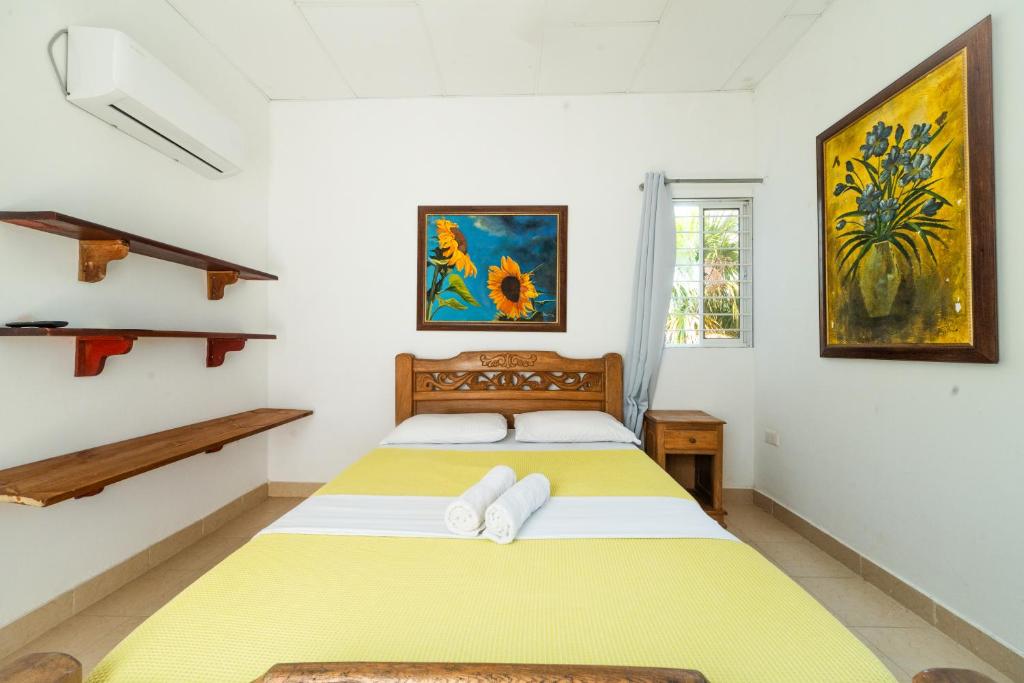 Postel nebo postele na pokoji v ubytování Hostal del Mar - Tolu