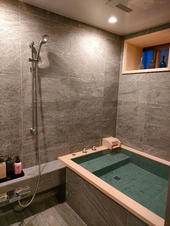 Koupelna v ubytování Yoshii Ryokan