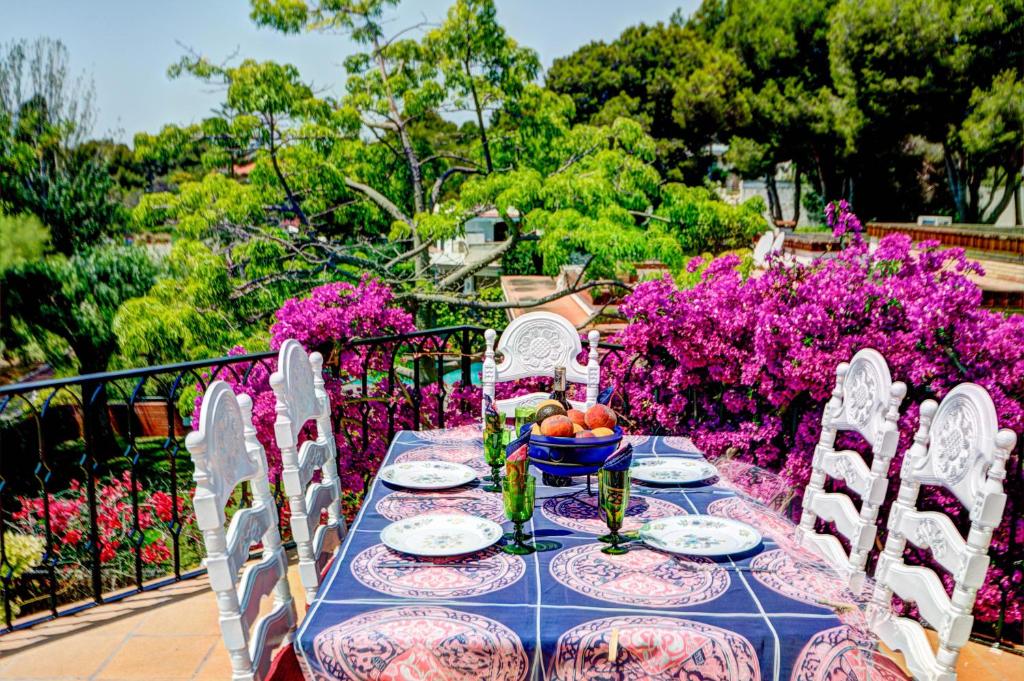 A garden outside Can Ferran by Hello Homes Sitges