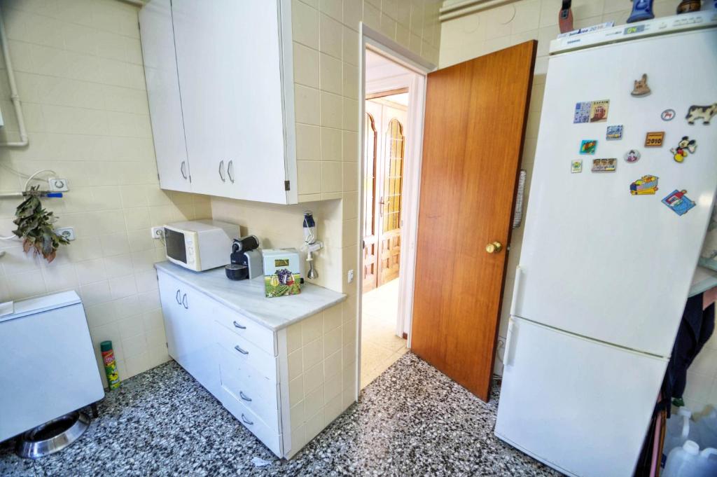A kitchen or kitchenette at Can Ferran by Hello Homes Sitges