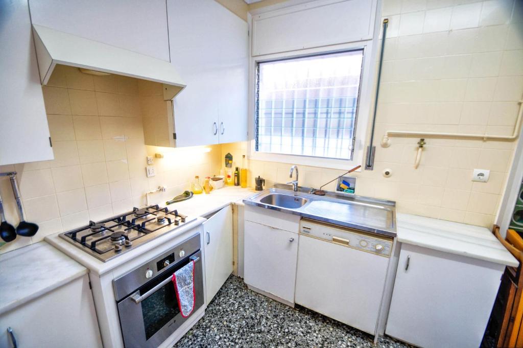 A kitchen or kitchenette at Can Ferran by Hello Homes Sitges