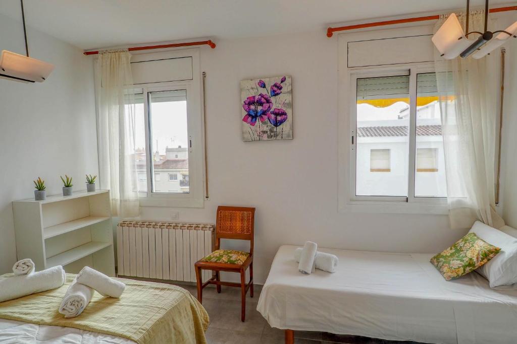 Postel nebo postele na pokoji v ubytování Linda Vista Oasis Penthouse by Hello Homes Sitges