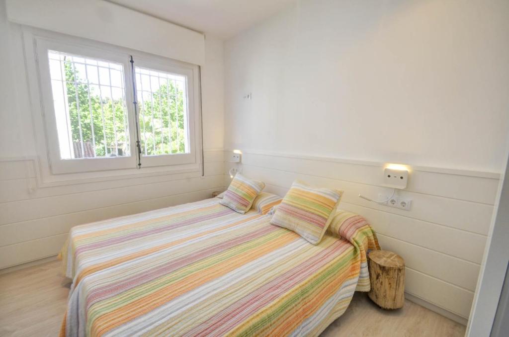 Posteľ alebo postele v izbe v ubytovaní The Luxor Apartment by Hello Homes Sitges