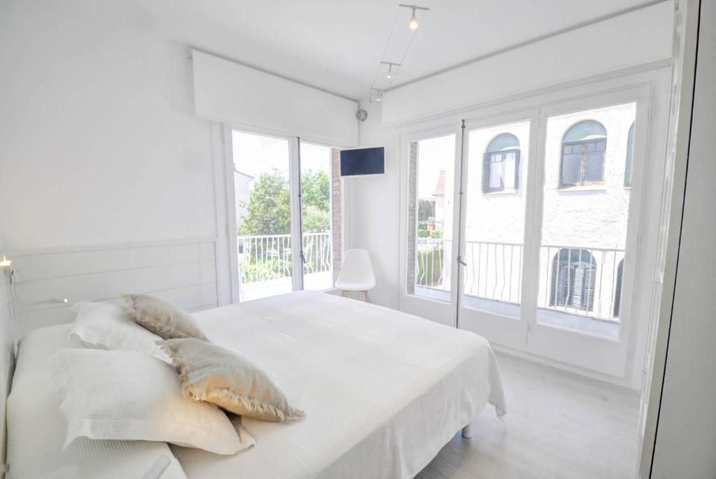 Posteľ alebo postele v izbe v ubytovaní The Luxor Apartment by Hello Homes Sitges