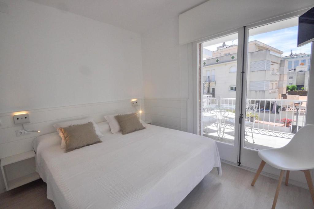 Posteľ alebo postele v izbe v ubytovaní The Luxor Apartment by Hello Homes Sitges