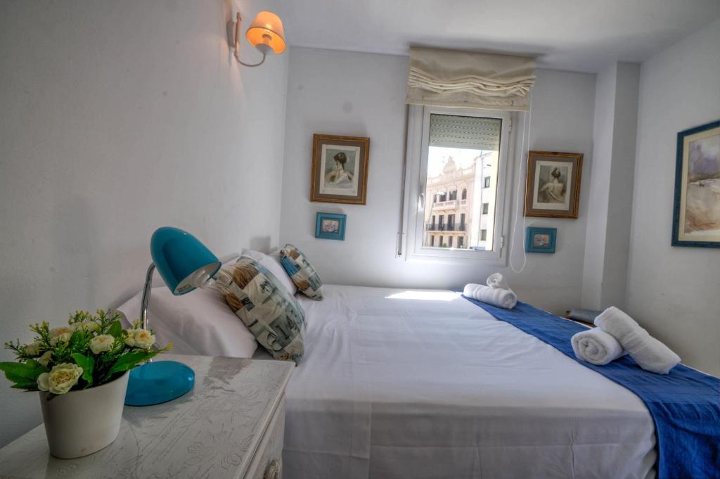 Postel nebo postele na pokoji v ubytování The Rose by Hello Homes Sitges