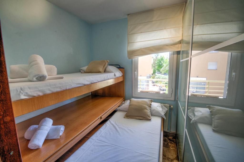 Postel nebo postele na pokoji v ubytování The Rose by Hello Homes Sitges