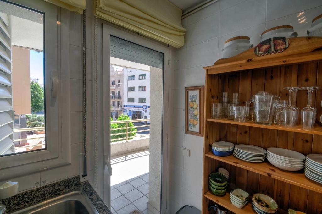 Kuchyň nebo kuchyňský kout v ubytování The Rose by Hello Homes Sitges