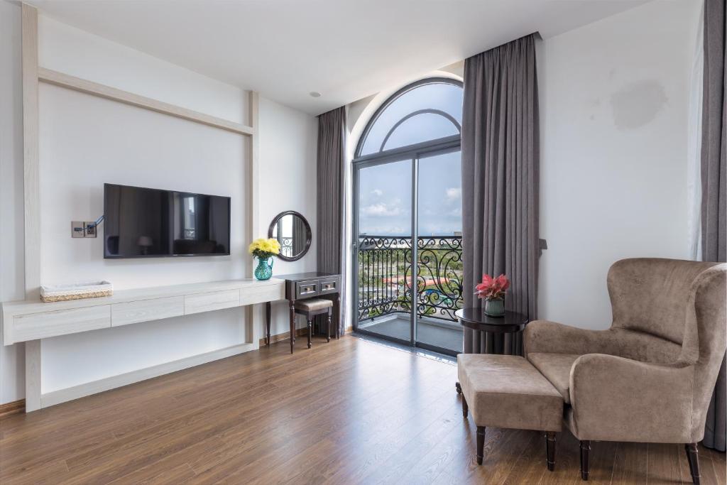 TV a/nebo společenská místnost v ubytování Florence Hotel