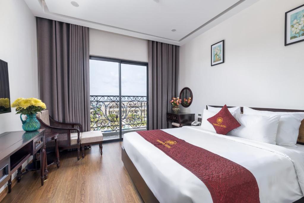 Postel nebo postele na pokoji v ubytování Florence Hotel