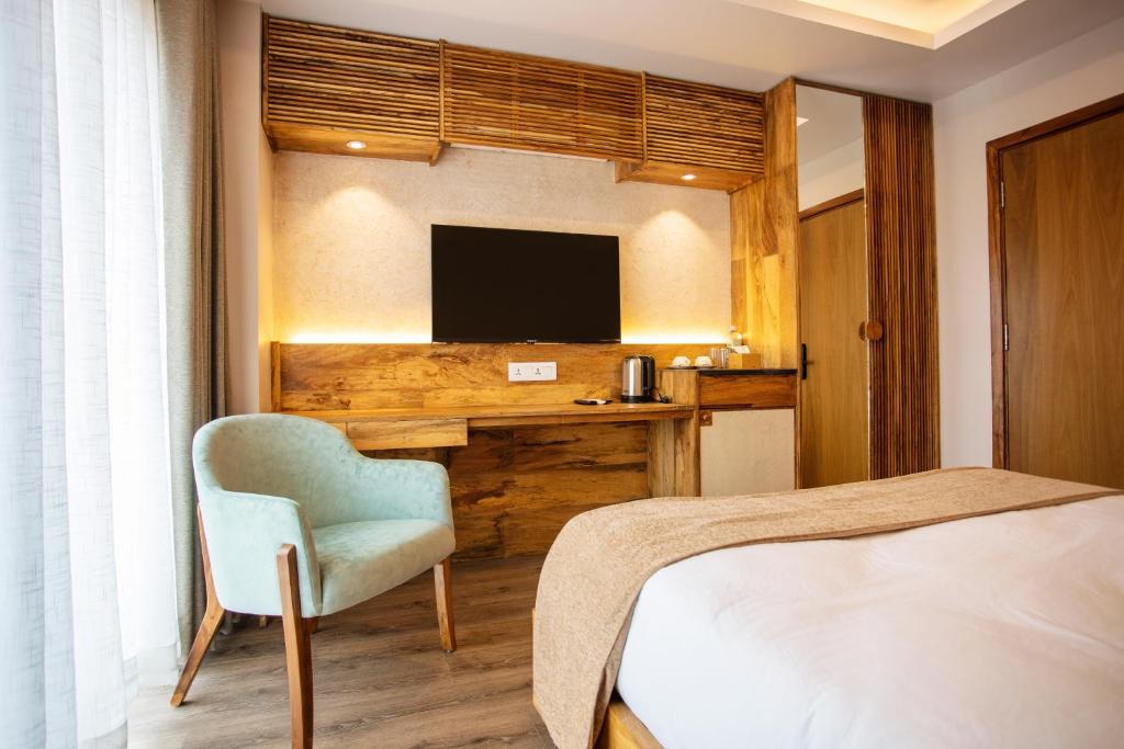TV a/nebo společenská místnost v ubytování HOTEL BHRIKUTI TARA