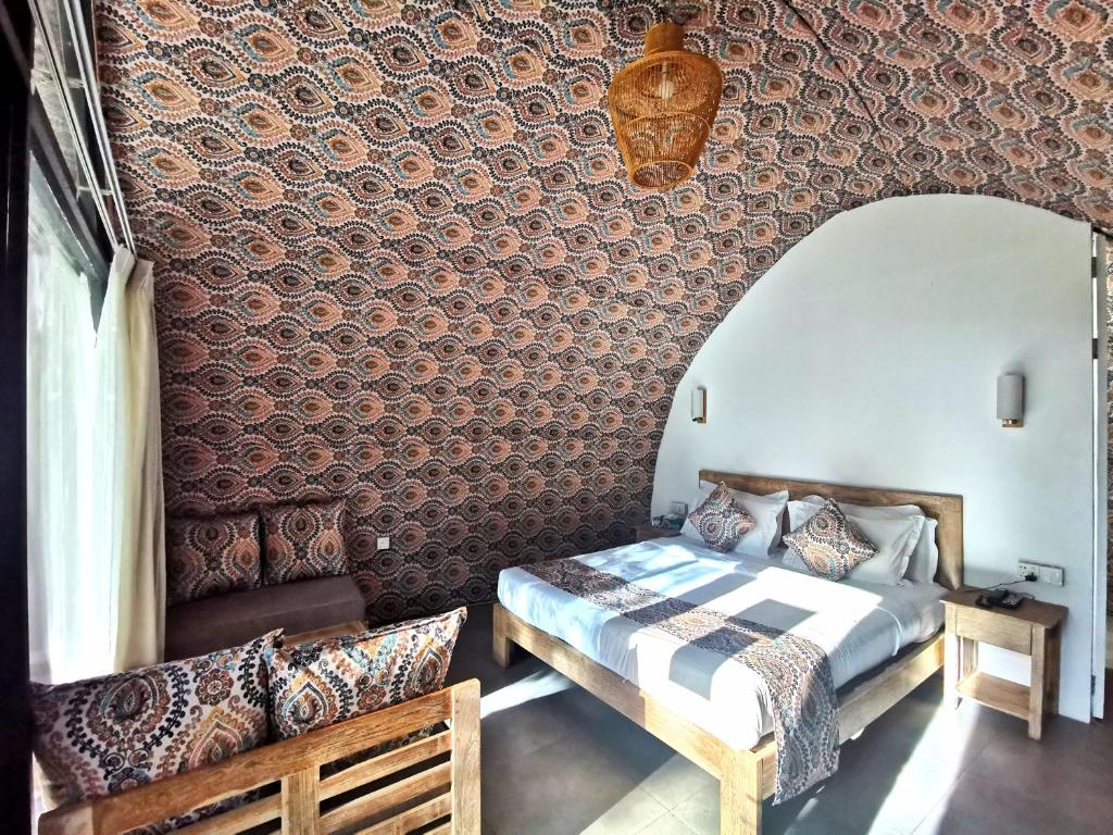 Postel nebo postele na pokoji v ubytování NIVADOO RESORT SIGIRIYA