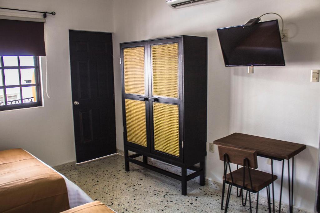 Postel nebo postele na pokoji v ubytování Múcara hotel