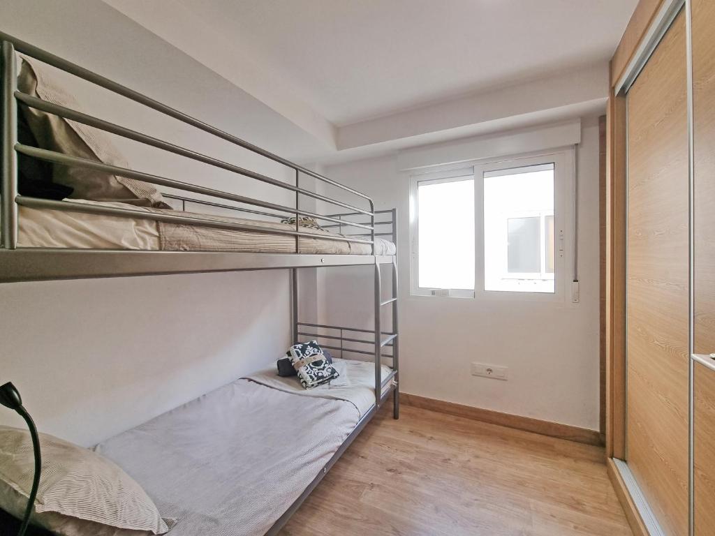 Postel nebo postele na pokoji v ubytování City Center Penthouse by NRAS
