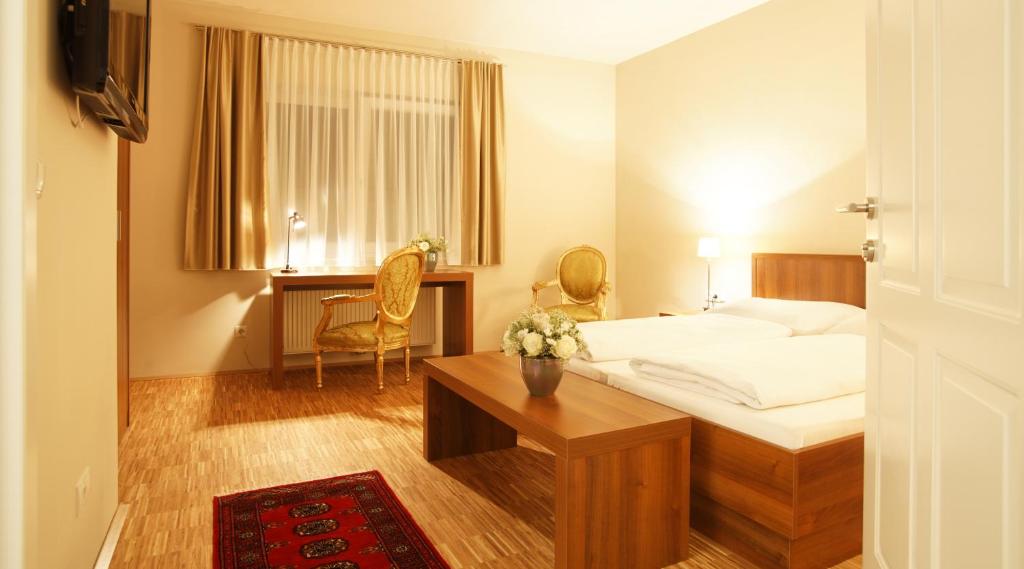 Posteľ alebo postele v izbe v ubytovaní Pfeiler's Bürgerstüberl - Hotel
