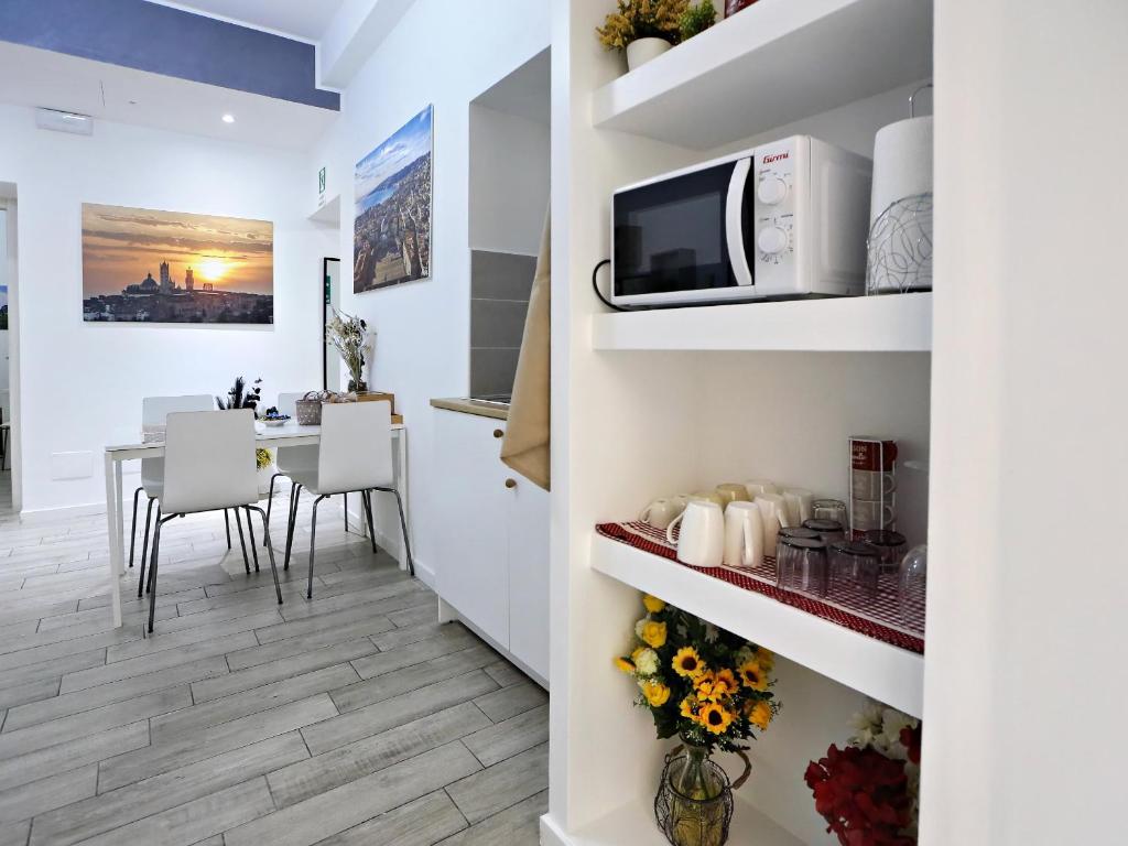 Kuchyň nebo kuchyňský kout v ubytování Relais Villa Borghese