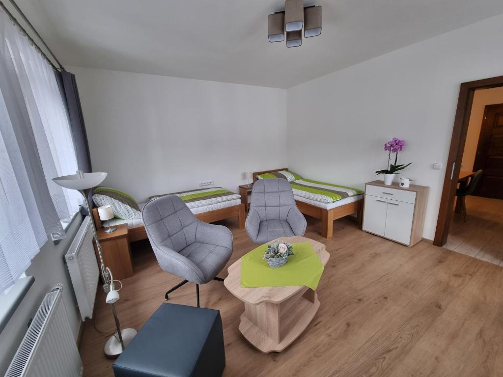 Posezení v ubytování Apartmán U Bašty