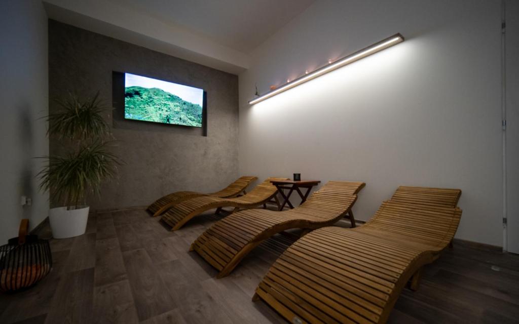 Posezení v ubytování YURA hotel Čeladná BAZÉN A SAUNY ZDARMA