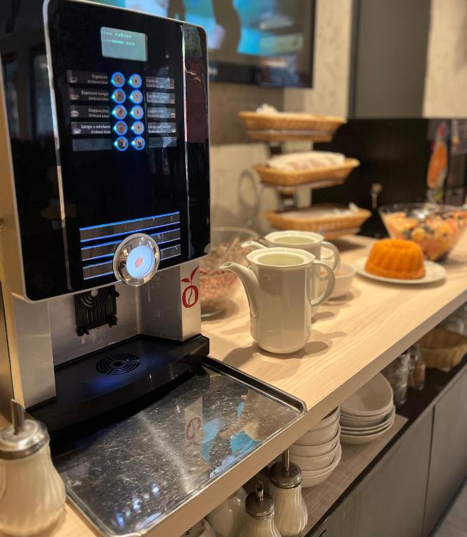 Kuchyň nebo kuchyňský kout v ubytování Apartmánový dom Fatrapark 1 s Wellness - Hlavná recepcia