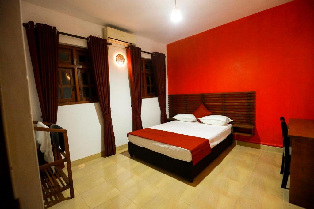 Postel nebo postele na pokoji v ubytování Stellar Inn