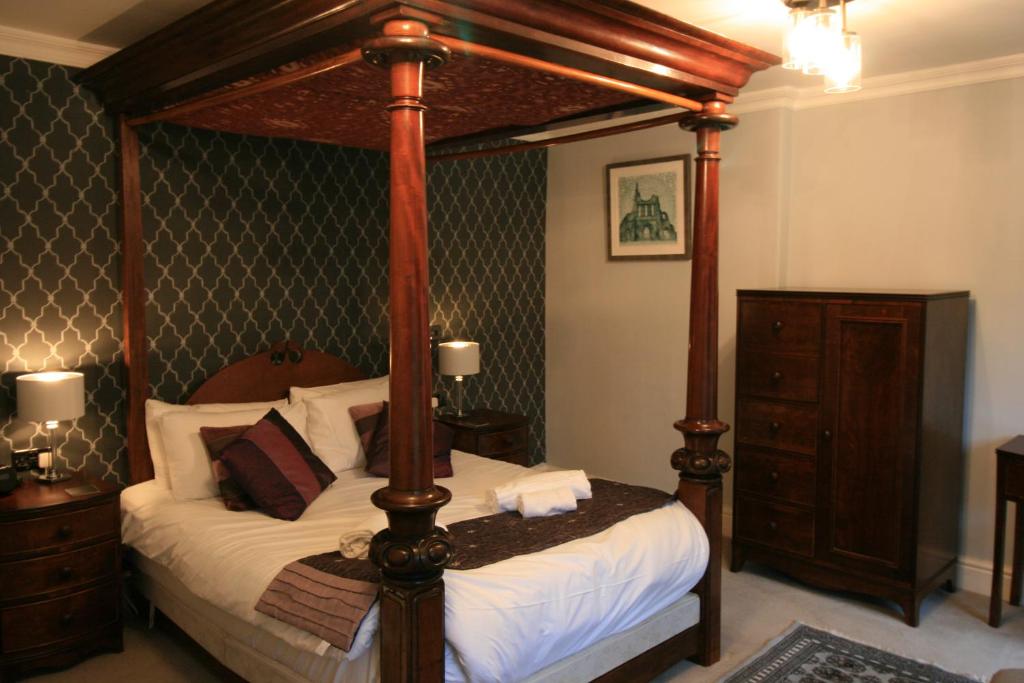 Postel nebo postele na pokoji v ubytování High Dalby House