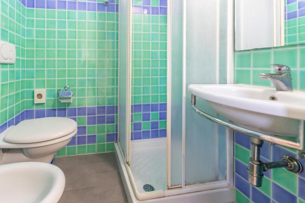 Koupelna v ubytování Hotel Vannucci