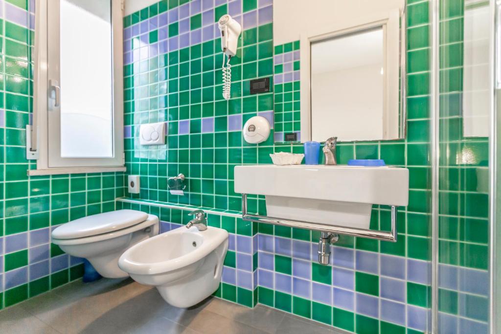 Koupelna v ubytování Hotel Vannucci