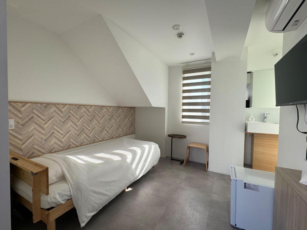 Postel nebo postele na pokoji v ubytování Hotel Apreton