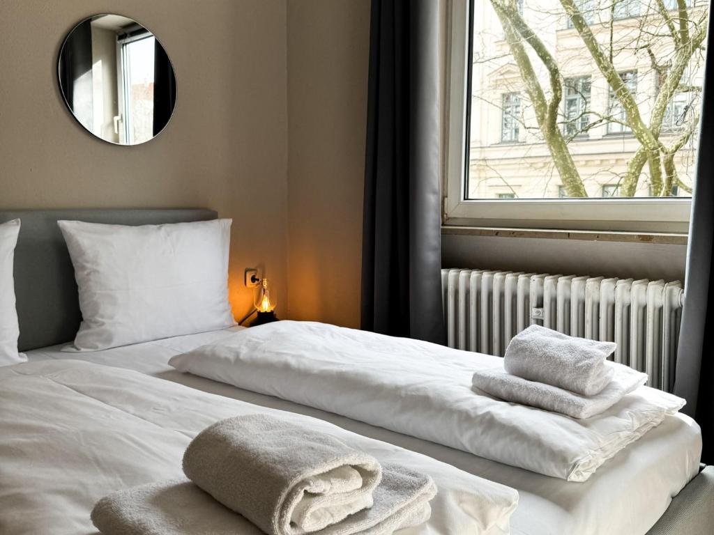 Postel nebo postele na pokoji v ubytování Hotel Sendlinger Tor