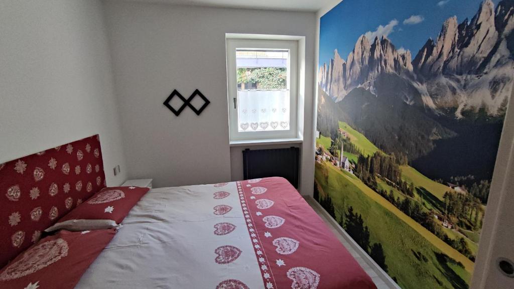 Postel nebo postele na pokoji v ubytování Apartments Giovannini