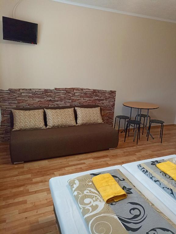 Postel nebo postele na pokoji v ubytování Abturist penzion