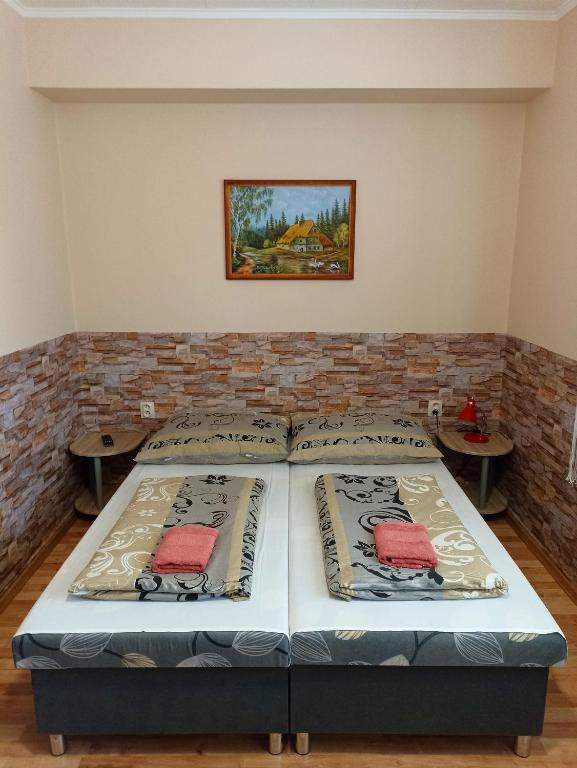 Postel nebo postele na pokoji v ubytování Abturist penzion