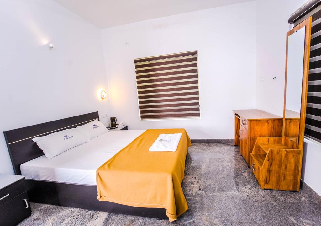 Postel nebo postele na pokoji v ubytování Cool Nest 5 BR Pool Villa Munnar by VOYE HOMES