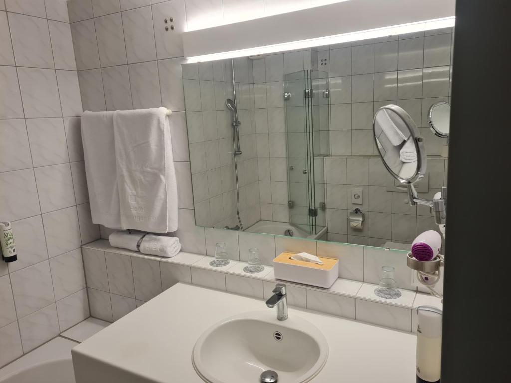 Koupelna v ubytování Hotel Bessunger Forst