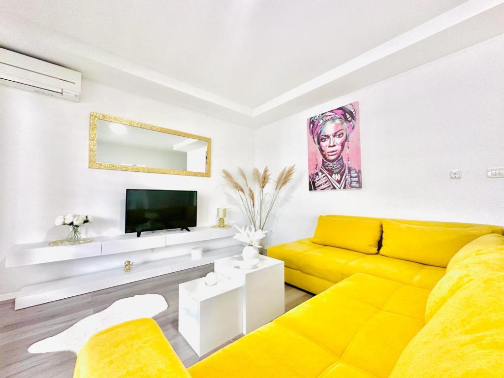 TV a/nebo společenská místnost v ubytování Apartman Niko