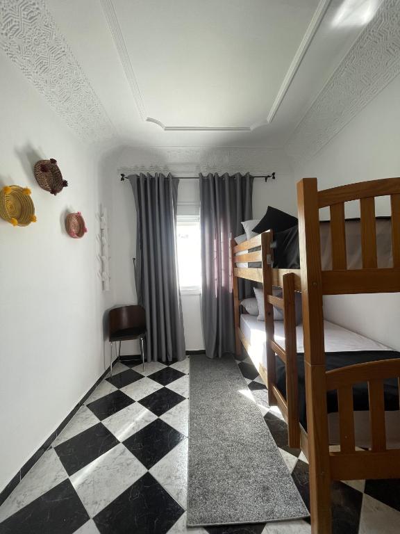 Postel nebo postele na pokoji v ubytování Casa Marwan