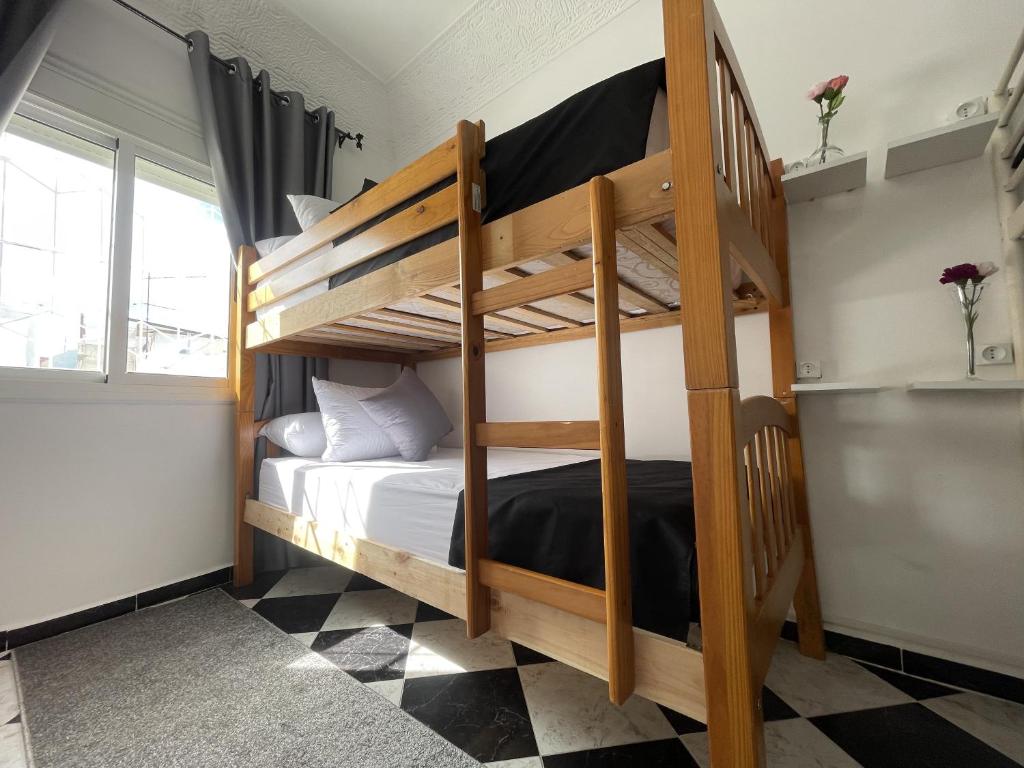Postel nebo postele na pokoji v ubytování Casa Marwan