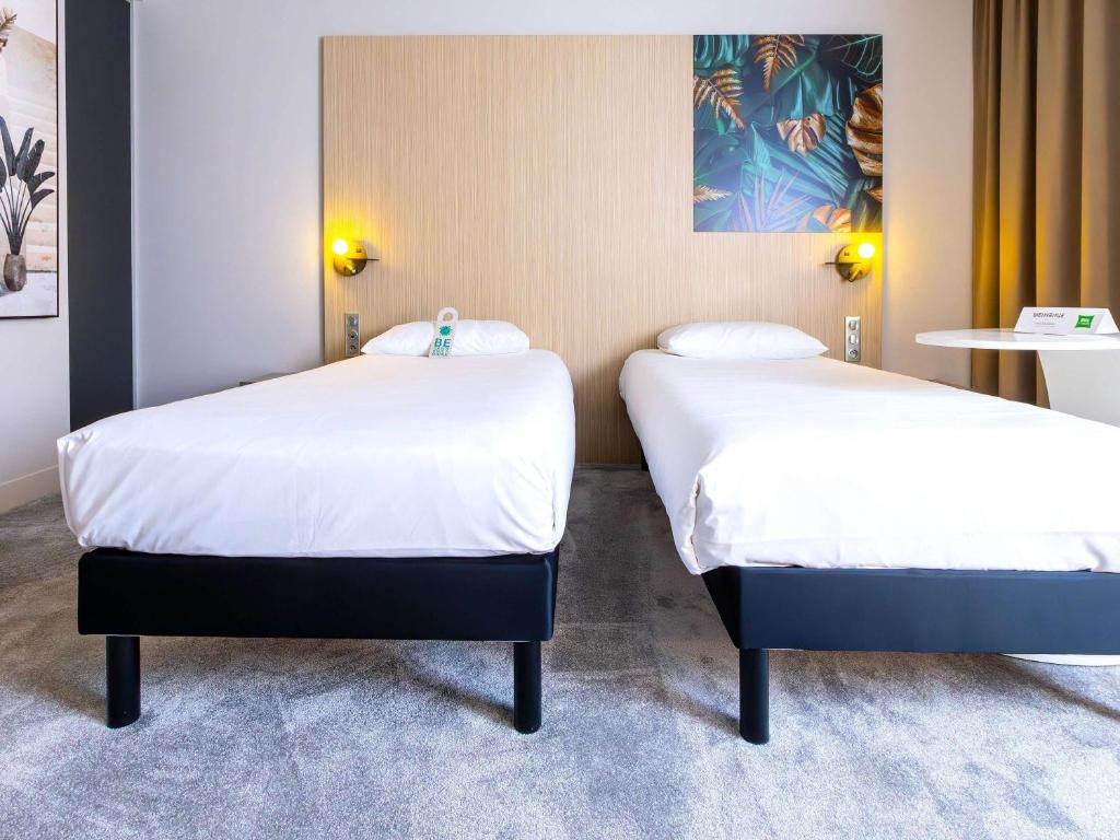 Postel nebo postele na pokoji v ubytování ibis Styles Troyes Centre