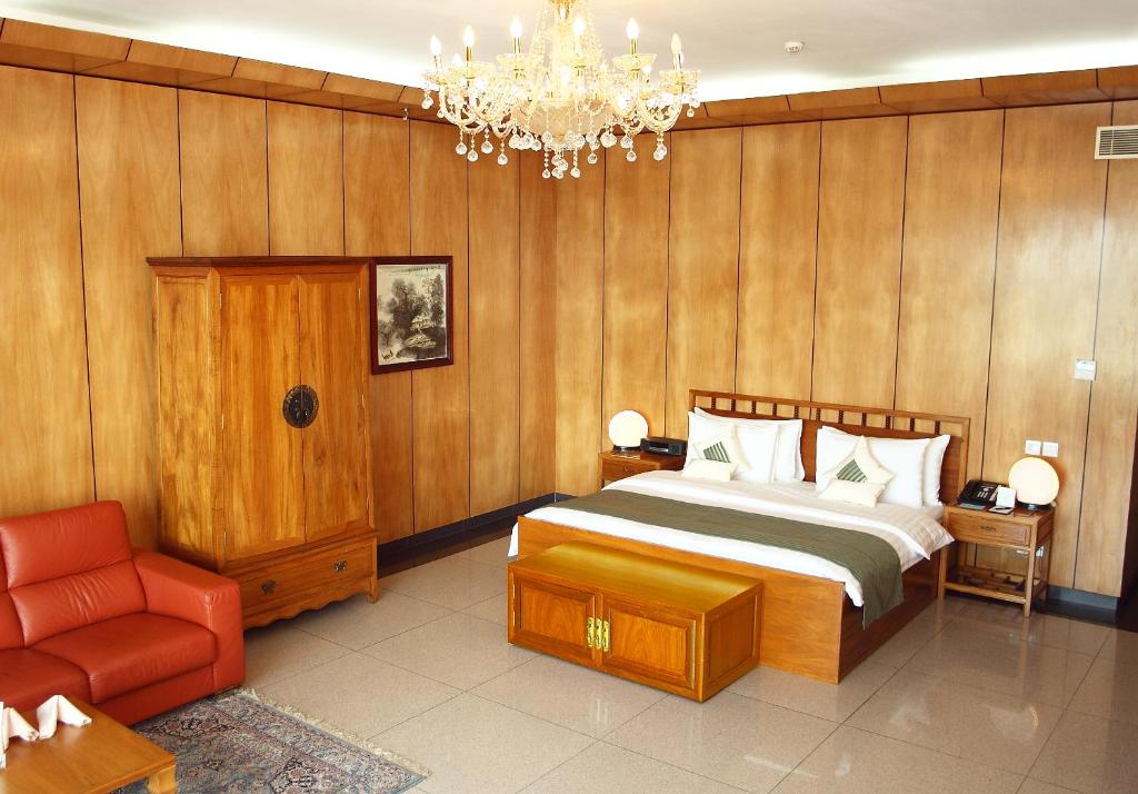 Rúm í herbergi á Lagos Oriental Hotel