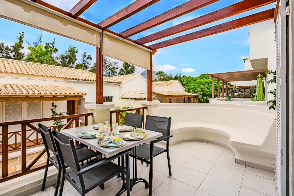 Un balcón o terraza de Chalet Playa de Las Americas