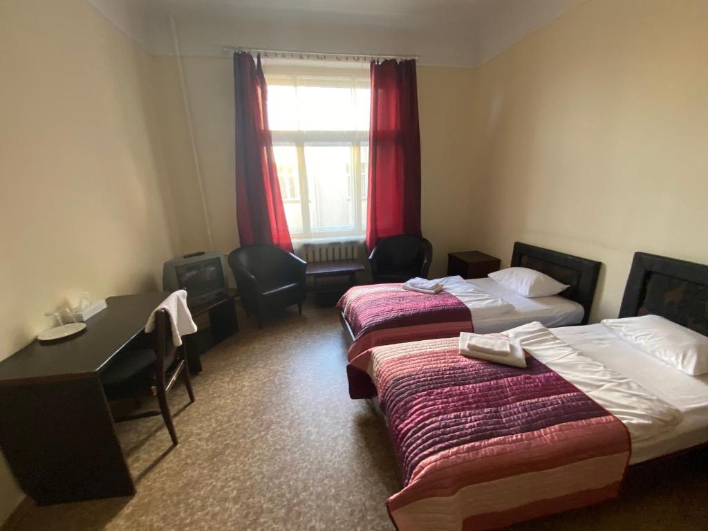 Postel nebo postele na pokoji v ubytování Hostel Viktorija with Private Rooms