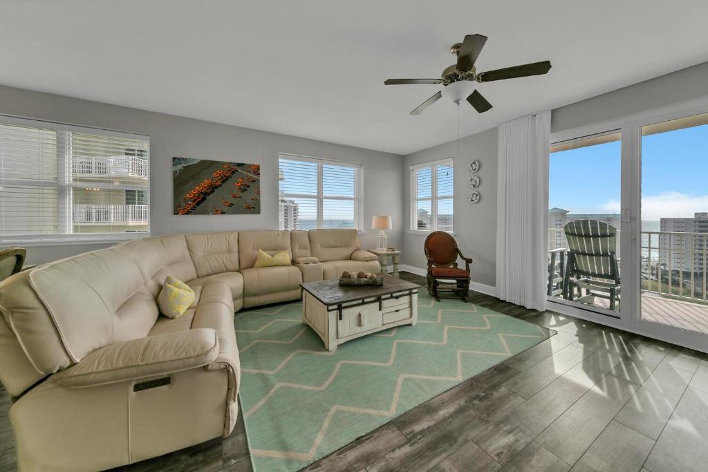 a living room with a couch and a table at Ariel Dunes II 1301 in Destin