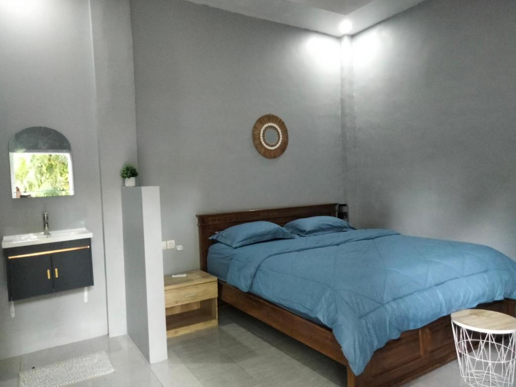 Postel nebo postele na pokoji v ubytování Sukha homestay